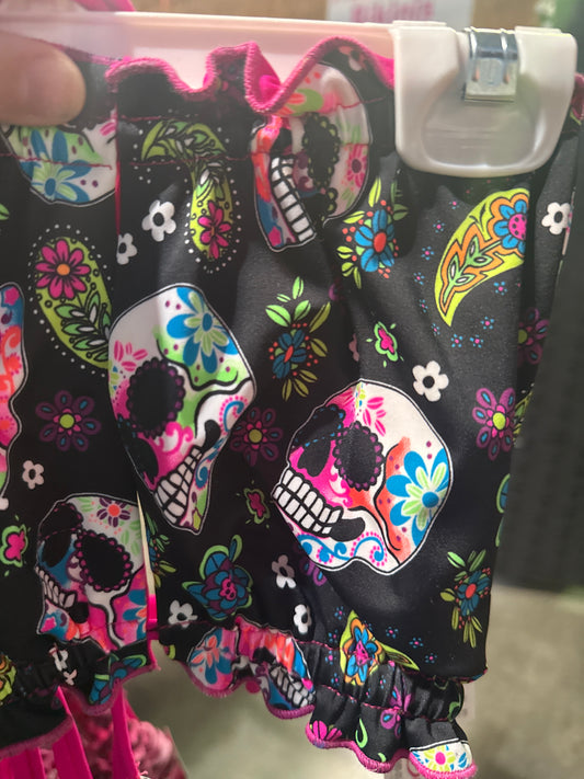 Ella Reversible Ruffle Top Black Pink Skulls