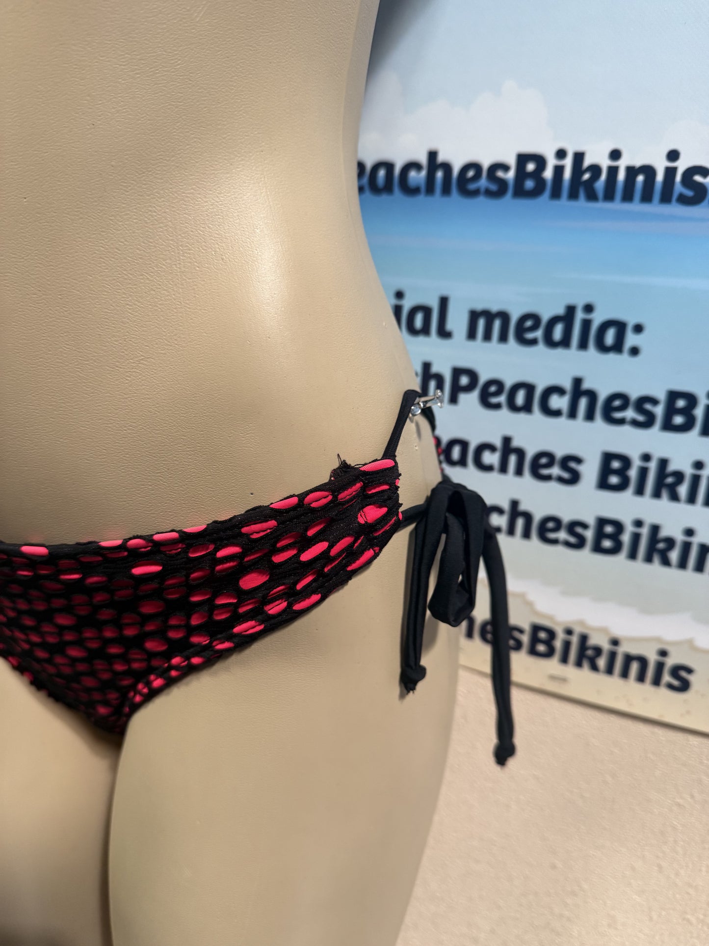 Tonga Bikini Bottoms Tie Sides Rave Coral with Black Crochet Net